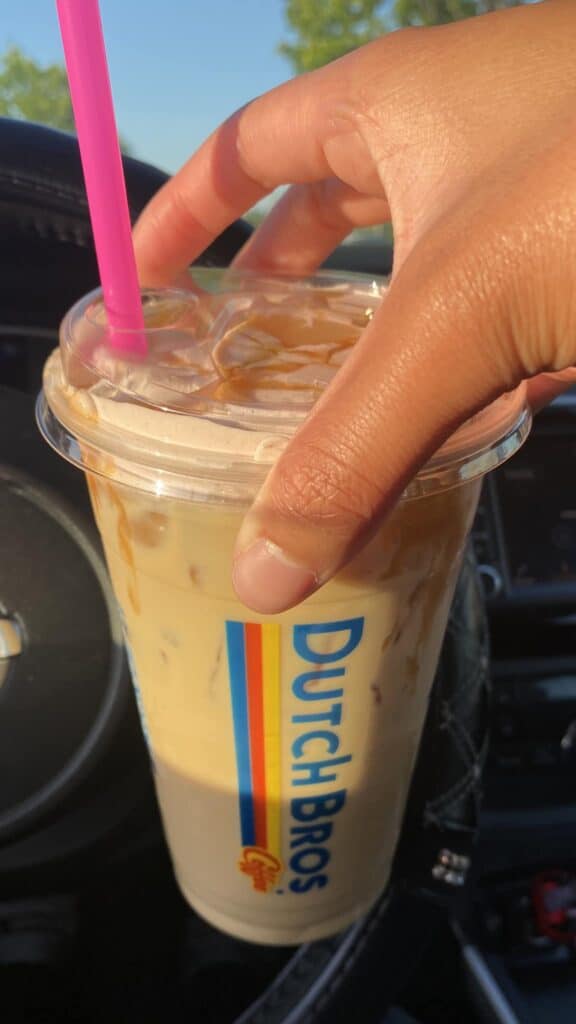 Banana cream pie latte with cinnamon spritz & soft top, caramel drizzle