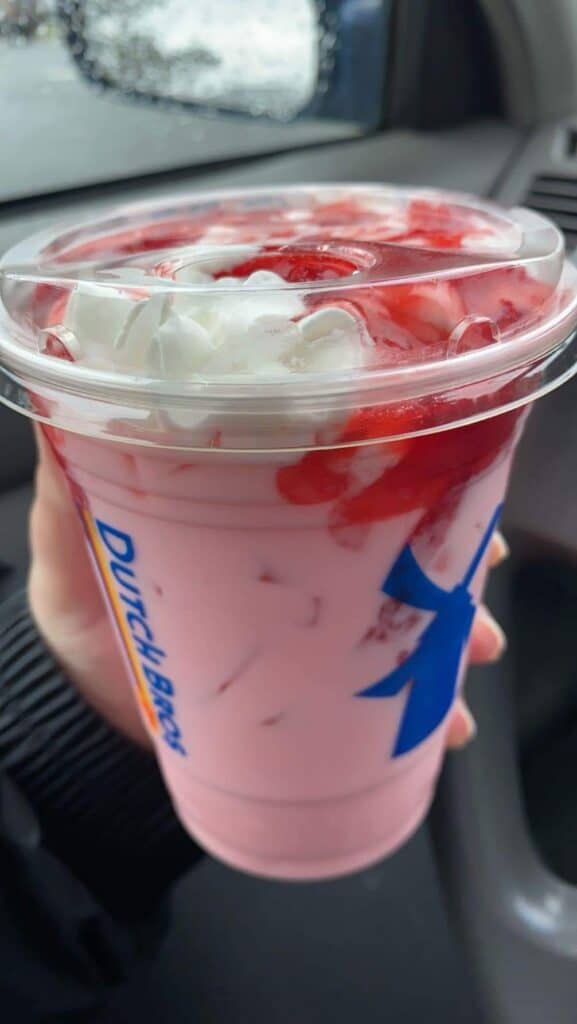 strawberry white coffee breve with vanilla and white chocolate with soft top and strawberry puree
